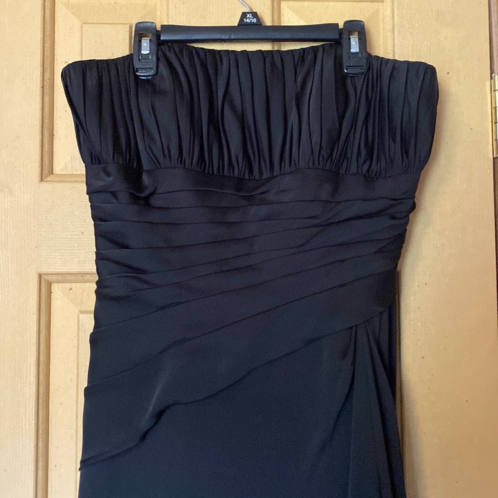 Pretty, long, black dress.